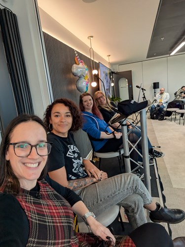 The hosts of Candid Contributions on stage ready to host the podcast